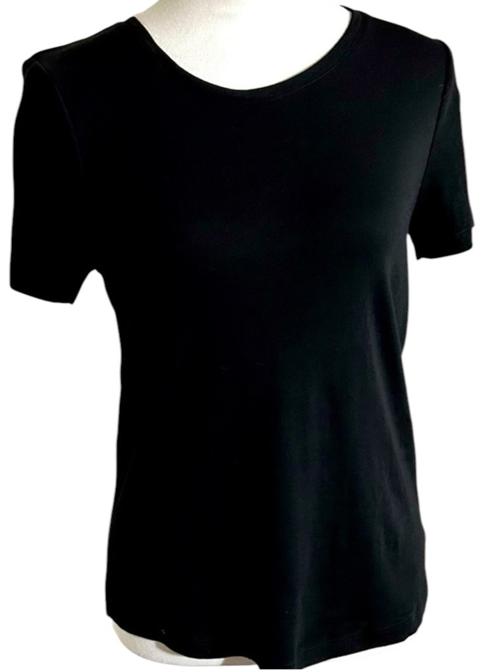 Chico’s black round neck knit shirt with short capped sleeves